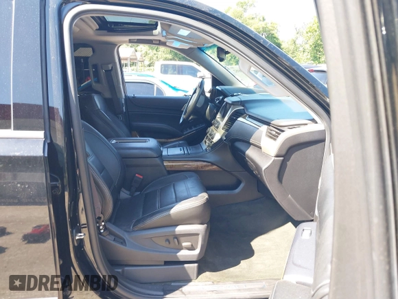 2015 GMC Yukon XL Denali with VIN 1GKS2JKJ9FR244754, listed as a IAAI auction lot 39706952 with 94,917 mi miles. Bid and sale history available at carsss.com. Image 5.