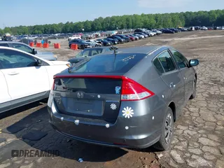 2010 Honda Insight LX with VIN JHMZE2H52AS032697, listed as a IAAI auction lot 42255794 with 262,251 mi miles and . Bid and sale history available at DreamBid. Image 4.