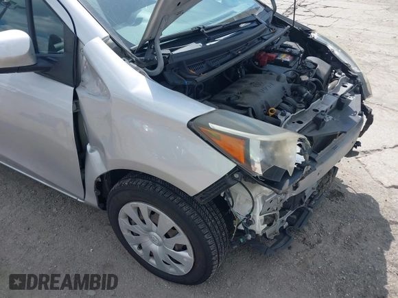2015 Toyota Yaris L with VIN VNKJTUD34FA026280, listed as a IAAI auction lot 41691078 with 81,030 mi miles and . Bid and sale history available at carsss.com. Image 6.