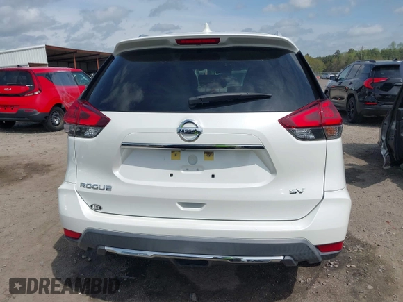 2018 Nissan Rogue SV with VIN KNMAT2MT8JP597774, listed as a IAAI auction lot 41956655 with 63,237 mi miles and . Bid and sale history available at carsss.com. Image 16.