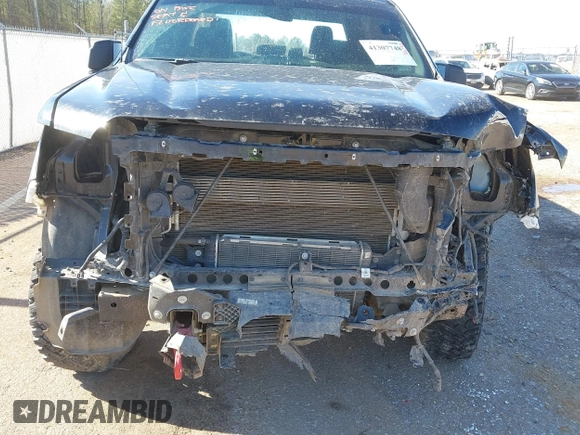 2021 GMC Sierra 1500 AT4 with VIN 1GTU9EET9MZ410854, listed as a IAAI auction lot 41307748 with 75,917 mi miles. Bid and sale history available at carsss.com. Image 6.