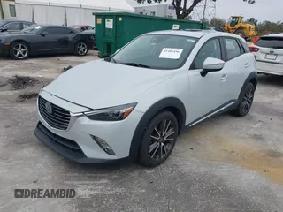 2016 Mazda CX-3 Grand Touring with VIN JM1DKDD72G0128891, listed as a IAAI auction lot 41401456 with 60,911 mi miles. Bid and sale history available at carsss.com. Image 17.