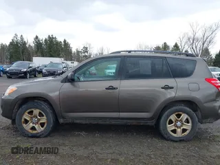 2011 Toyota RAV4 with VIN 2T3BK4DV1BW048945, listed as a IAAI auction lot 42047540 with 215,032 mi miles. Bid and sale history available at carsss.com. Image 14.