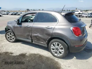 2017 FIAT 500X Lounge with VIN ZFBCFXDB7HP518161, listed as a Copart auction lot 60134985 with 51,357 mi miles and Salvage title. Bid and sale history available at DreamBid. Image 2.