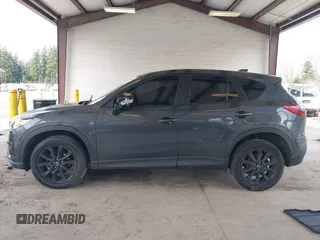 2015 Mazda CX-5 Grand Touring with VIN JM3KE2DY0F0508796, listed as a IAAI auction lot 41798482 with 110,260 mi miles. Bid and sale history available at carsss.com. Image 14.