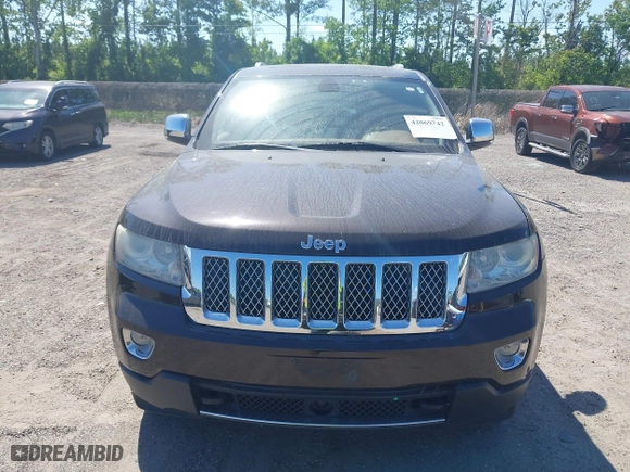 2011 Jeep Grand Cherokee Overland with VIN 1J4RR6GT1BC647292, listed as a IAAI auction lot 42069742 with 199,340 mi miles. Bid and sale history available at carsss.com. Image 6.