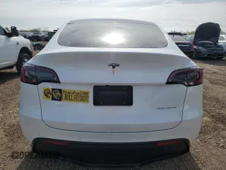 2022 Tesla Model Y Long Range z VIN 7SAYGAEE2NF465173, wystawiony jako Copart lot #53983845 z przebiegiem 42 740 mil mil oraz Szkody całkowita. Historia ofert i sprzedaży dostępna na DreamBid. Obrazek 6.
