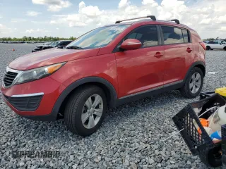2012 Kia Sportage LX with VIN KNDPB3A29C7328474, listed as a Copart auction lot 65731335 with 124,422 mi miles and Clean title. Bid and sale history available at DreamBid. Image 1.
