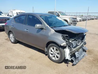 2012 Nissan Versa SV with VIN 3N1CN7AP8CL906636, listed as a IAAI auction lot 42007827 with 111,627 mi miles. Bid and sale history available at carsss.com. Image 1.