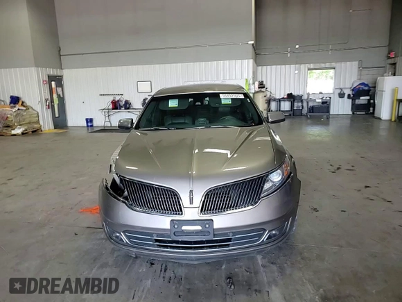 2016 Lincoln MKS с VIN 1LNHL9DK3GG600907, выставлен на аукционе Copart как лот 56892995 с пробегом 122 220 миль миль и Списание • Salvage title. История ставок и продаж доступна на DreamBid. Изображение 14.