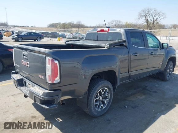 2016 GMC Canyon 4WD SLE with VIN 1GTG6CE32G1189451, listed as a IAAI auction lot 42057262 with 143,721 mi miles and . Bid and sale history available at DreamBid. Image 4.
