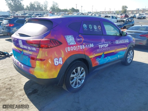2019 Hyundai Tucson Value with VIN KM8J33A43KU067973, listed as a IAAI auction lot 40122626 with 107,358 mi miles. Bid and sale history available at carsss.com. Image 4.