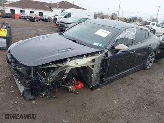 2018 Kia Stinger GT with VIN KNAE35LC4J6027939, listed as a IAAI auction lot 41790058 with 82,723 mi miles. Bid and sale history available at carsss.com. Image 2.