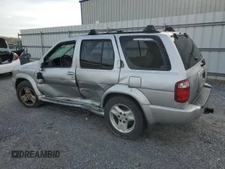 2003 Infiniti QX4 Luxury z VIN JNRDR09Y33W301556, wystawiony jako Copart lot #47765914 z przebiegiem Nie podano mil oraz Szkody całkowita. Historia ofert i sprzedaży dostępna na DreamBid. Obrazek 2.