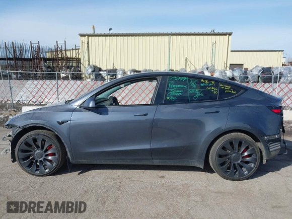 2023 Tesla Model Y Performance with VIN 7SAYGDEF7PF590750, listed as a IAAI auction lot 41694002 with Not Provided miles and . Bid and sale history available at DreamBid. Image 14.