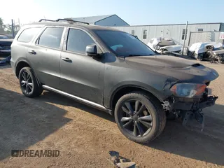 2013 Dodge Durango Crew z VIN 1C4SDJDT1DC590351, wystawiony jako IAAI lot #42662889 z przebiegiem 225 086 mil mil oraz . Historia ofert i sprzedaży dostępna na DreamBid. Obrazek 1.