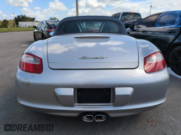 2006 Porsche Boxster с VIN WP0CA29866U710780, выставлен на аукционе Copart как лот 74619804 с пробегом Не указан миль и На запчасти • Non repairable. История ставок и продаж доступна на DreamBid. Изображение 6.