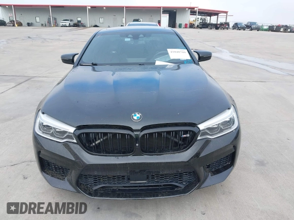 2019 BMW M5 z VIN WBSJF0C51KB447804, wystawiony jako IAAI lot #41848760 z przebiegiem 83 303 mil mil oraz . Historia ofert i sprzedaży dostępna na DreamBid. Obrazek 12.