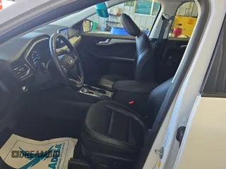 2021 Ford Escape SEL Hybrid with VIN 1FMCU9CZ1MUB25597, listed as a IAAI auction lot 42663573 with 79,061 mi miles and . Bid and sale history available at DreamBid. Image 40.