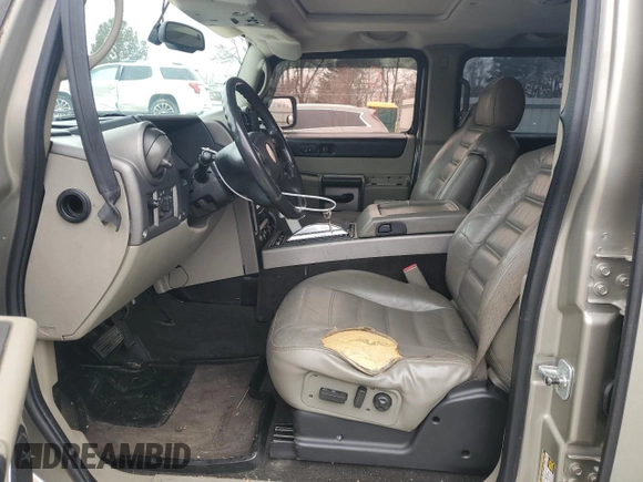 2004 Hummer H2 with VIN 5GRGN23U24H118230, listed as a Copart auction lot 87764075 with 202,206 mi miles and Salvage Title. Bid and sale history available at carsss.com. Image 7.