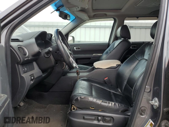 2012 Honda Pilot Touring with VIN 5FNYF4H99CB045763, listed as a Copart auction lot 54984825 with 217,548 mi miles and Clean Title. Bid and sale history available at DreamBid. Image 7.
