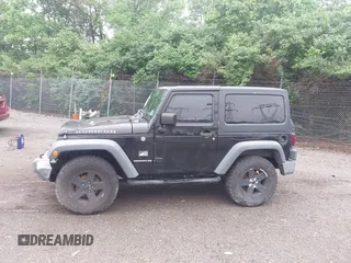 2007 Jeep Wrangler Rubicon with VIN 1J4GA64117L149666, listed as a IAAI auction lot 42252464 with 100,791 mi miles and . Bid and sale history available at DreamBid. Image 14.