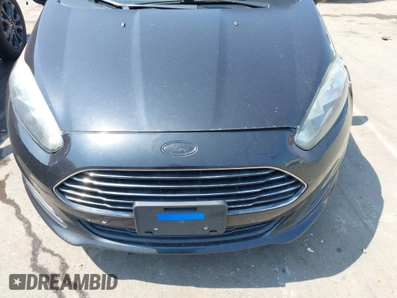 2014 Ford Fiesta SE z VIN 3FADP4BJ9EM211010, wystawiony jako IAAI lot #42420562 z przebiegiem 175 335 mil mil oraz . Historia ofert i sprzedaży dostępna na DreamBid. Obrazek 6.
