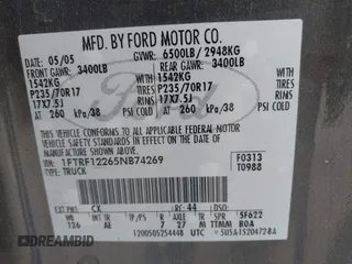 2005 Ford F-150 XL z VIN 1FTRF12265NB74269, wystawiony jako IAAI lot #42267542 z przebiegiem 180 386 mil mil oraz . Historia ofert i sprzedaży dostępna na DreamBid. Obrazek 9.
