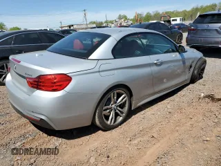 2014 BMW 4 Series 428i xDrive with VIN WBA3T1C58EP819710, listed as a Copart auction lot 54699235 with 196,856 mi miles and Salvage Title. Bid and sale history available at carsss.com. Image 3.