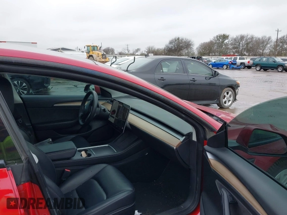 2021 Tesla Model 3 Long Range with VIN 5YJ3E1EB2MF079595, listed as a IAAI auction lot 41621546 with 45,616 mi miles. Bid and sale history available at carsss.com. Image 5.