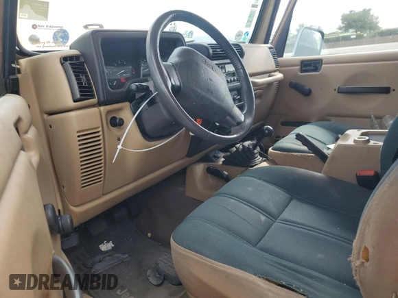 1999 Jeep Wrangler Sahara with VIN 1J4FY49S3XP441051, listed as a Copart auction lot 50946175 with 112,884 mi miles and Salvage Title. Bid and sale history available at carsss.com. Image 8.