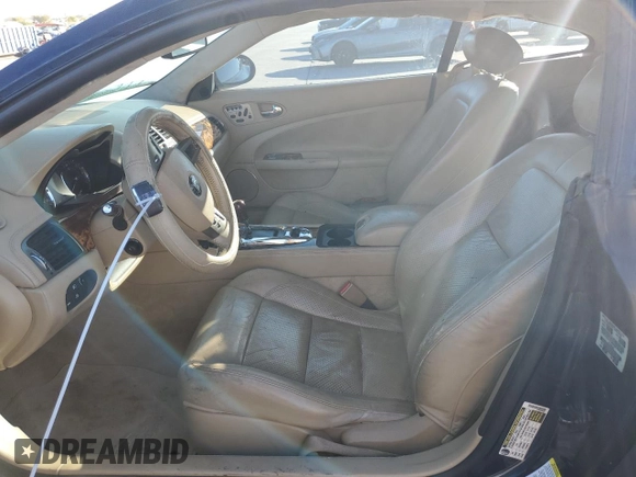 2008 Jaguar XK with VIN SAJWA43C589B23096, listed as a Copart auction lot 79337334 with 143,902 mi miles and Salvage Title. Bid and sale history available at carsss.com. Image 7.