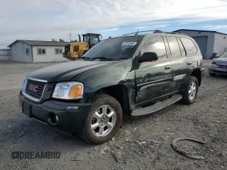 2004 GMC Envoy SLT with VIN 1GKDT13S642185410, listed as a Copart auction lot 72572504 with 136,193 mi miles and Salvage Title. Bid and sale history available at DreamBid. Image 1.
