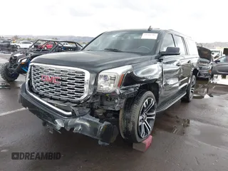 2019 GMC Yukon XL SLT with VIN 1GKS1GKC7KR155668, listed as a IAAI auction lot 41751792 with 163,537 mi miles. Bid and sale history available at carsss.com. Image 18.