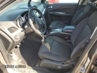 2013 Dodge Journey SXT with VIN 3C4PDCBGXDT630423, listed as a Copart auction lot 62359685 with 151,653 mi miles and Salvage title. Bid and sale history available at DreamBid. Image 7.