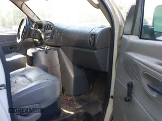 2004 Ford Econoline Cargo Commercial with VIN 1FTNE24W04HA50342, listed as a IAAI auction lot 42145274 with 158,408 mi miles and . Bid and sale history available at carsss.com. Image 5.