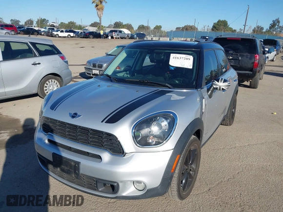 2013 MINI Countryman S ALL4 with VIN WMWZC5C58DWP30774, listed as a IAAI auction lot 41637209 with 101,540 mi miles and . Bid and sale history available at DreamBid. Image 18.