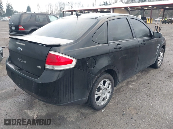 2008 Ford Focus SE with VIN 1FAHP35N08W105379, listed as a IAAI auction lot 41424575 with 210,985 mi miles. Bid and sale history available at carsss.com. Image 4.