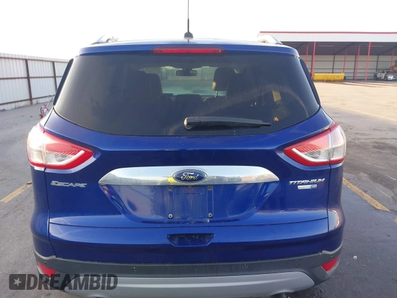 2014 Ford Escape Titanium with VIN 1FMCU9JX4EUD30964, listed as a IAAI auction lot 41772153 with 179,481 mi miles and . Bid and sale history available at DreamBid. Image 16.