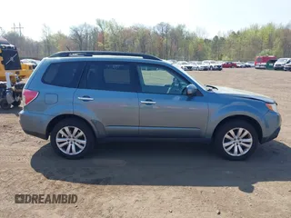 2011 Subaru Forester X Limited with VIN JF2SHAEC9BH713866, listed as a IAAI auction lot 42114557 with 148,404 mi miles and . Bid and sale history available at DreamBid. Image 13.