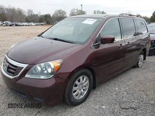 2010 Honda Odyssey EX-L with VIN 5FNRL3H77AB017916, listed as a IAAI auction lot 41855368 with 204,567 mi miles. Bid and sale history available at carsss.com. Image 2.