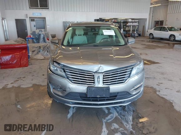 2016 Lincoln MKC Reserve with VIN 5LMCJ3C93GUJ19078, listed as a IAAI auction lot 41633487 with 91,961 mi miles and . Bid and sale history available at DreamBid. Image 12.