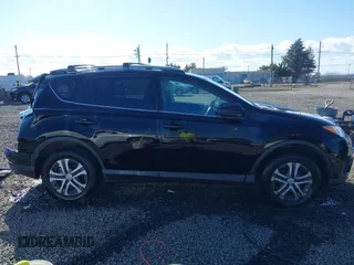 2017 Toyota RAV4 LE with VIN 2T3BFREV4HW586497, listed as a IAAI auction lot 41725876 with 73,666 mi miles. Bid and sale history available at carsss.com. Image 14.