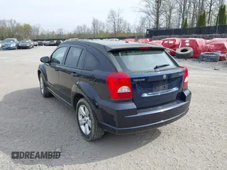 2011 Dodge Caliber Mainstreet with VIN 1B3CB3HA6BD121439, listed as a IAAI auction lot 42131091 with 92,850 mi miles. Bid and sale history available at carsss.com. Image 3.