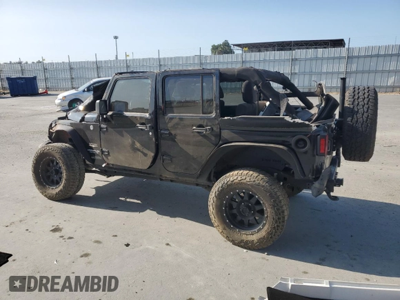 2012 Jeep Wrangler Unlimited Sahara with VIN 1C4BJWEG5CL235835, listed as a Copart auction lot 60673555 with 86,606 mi miles and Salvage title. Bid and sale history available at DreamBid. Image 2.