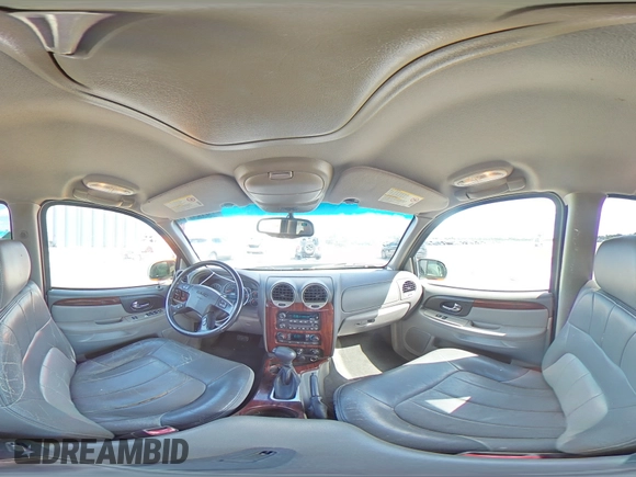 2002 GMC Envoy SLT with VIN 1GKDT13S122491329, listed as a Copart auction lot 75161714 with 149,659 mi miles and Salvage Title. Bid and sale history available at DreamBid. Image 14.