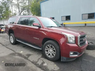 2019 GMC Yukon XL SLT with VIN 1GKS2GKC6KR341781, listed as a Copart auction lot 77468734 with 93,482 mi miles and Salvage Title. Bid and sale history available at DreamBid. Image 4.