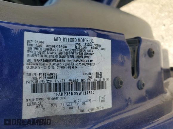 2005 Ford Focus SE with VIN 1FAHP36N05W134830, listed as a Copart auction lot 41696485 with 250,582 mi miles and Salvage Title. Bid and sale history available at carsss.com. Image 13.