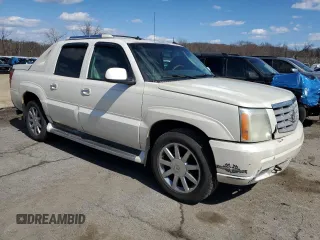 2003 Cadillac Escalade EXT z VIN 3GYEK63N43G144901, wystawiony jako Copart lot #50575195 z przebiegiem 236 328 mil mil oraz Tytuł czysty. Historia ofert i sprzedaży dostępna na DreamBid. Obrazek 4.