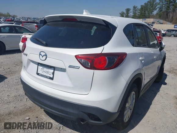 2013 Mazda CX-5 Touring with VIN JM3KE2CE0D0119032, listed as a IAAI auction lot 41891556 with 174,745 mi miles and . Bid and sale history available at carsss.com. Image 4.